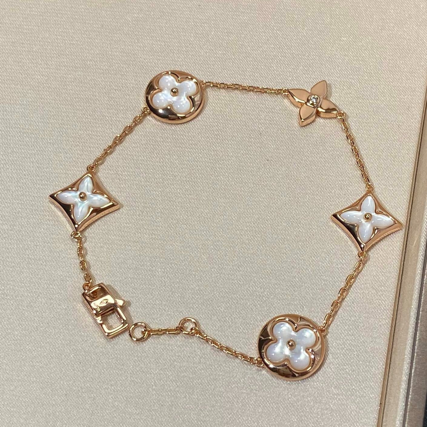 [Polaidi Jewelry]STAR AND SUN 5 MOTIF MOP PINK GOLD BRACELET