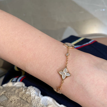[Polaidi Jewelry]STAR AND SUN 4 MOTIF WHITE MOP PINK GOLD BRACELET